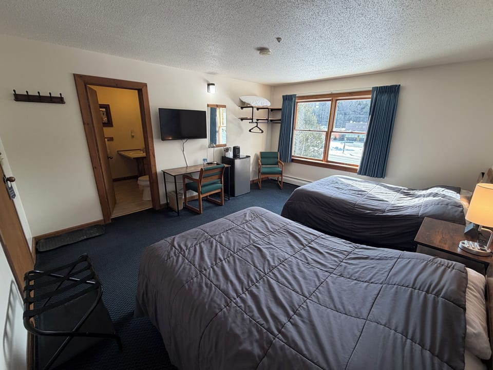 Premium Room, 2 Double Beds | Travel crib, rollaway beds (free), WiFi (free), individually decorated