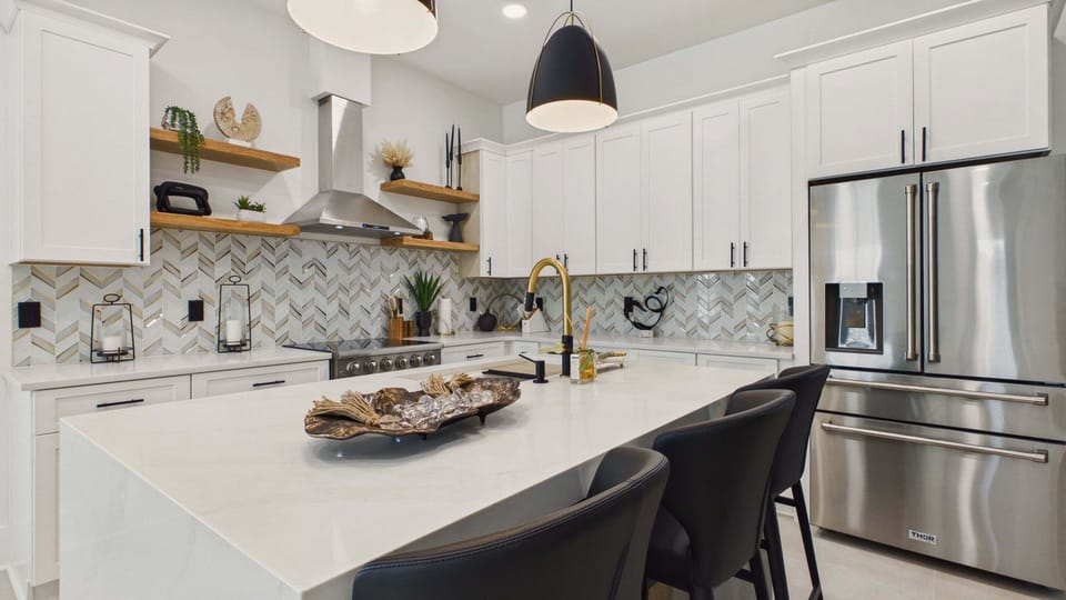 Huge kitchen with island and ample counter space for your culinary needs