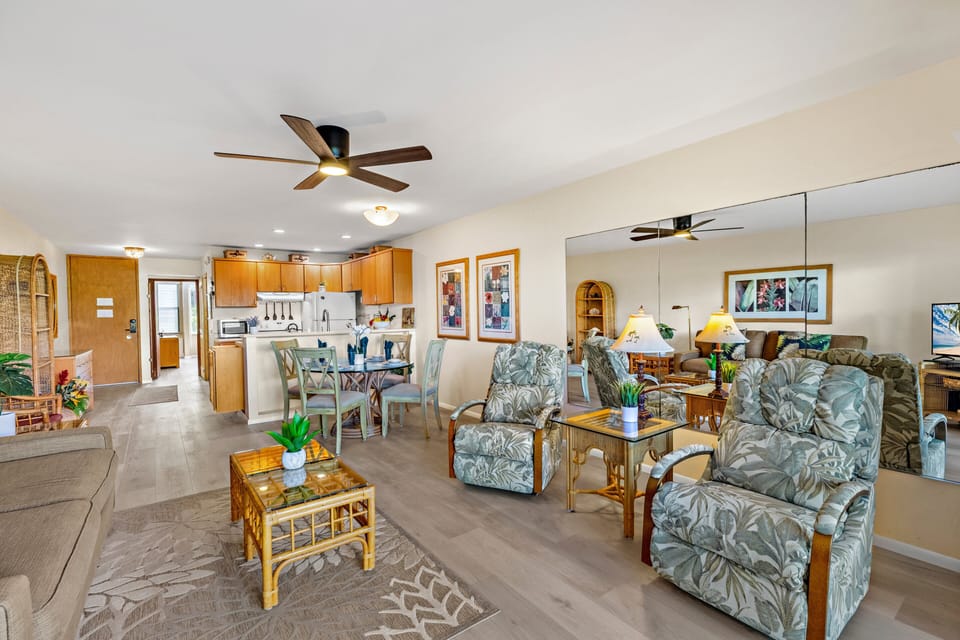 The bright, open living area offers comfortable seating and easy access to the lanai.