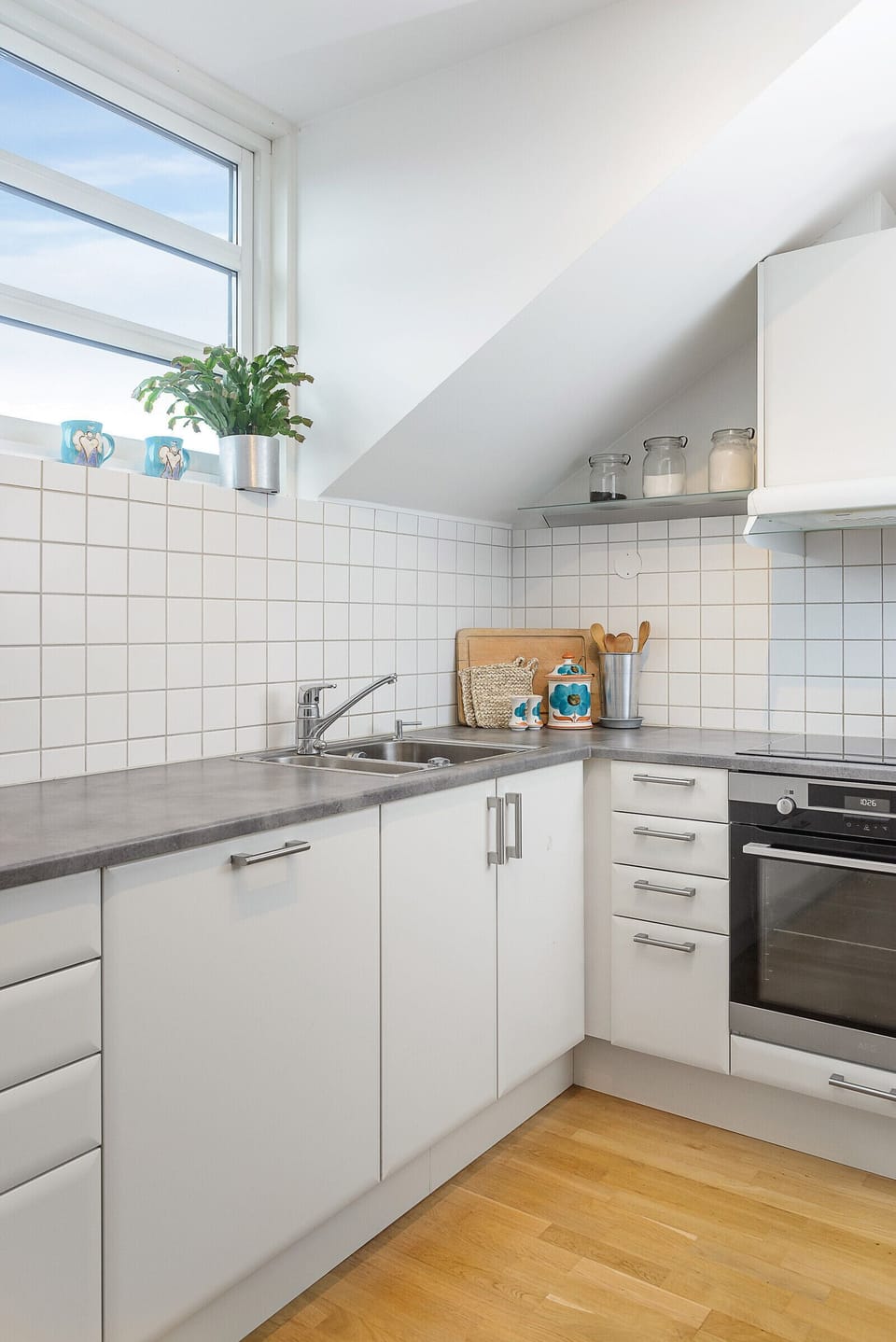 ​​Functional, fully-equipped kitchen with plenty of counter space, ideal for home-cooked meals