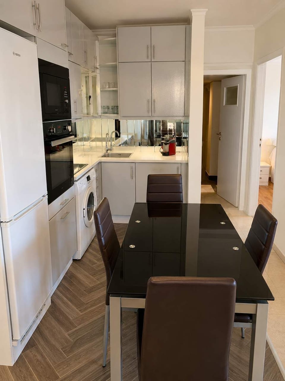 Open-plan kitchen and dining space with everything needed for longer stays