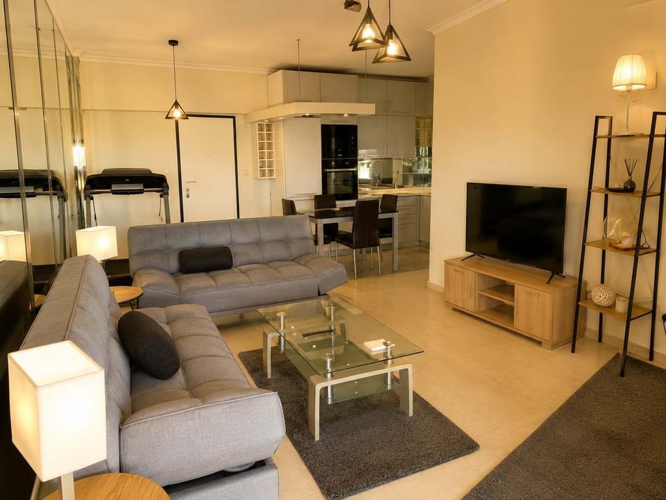 Bright and spacious living room with Smart TV and open-plan layout