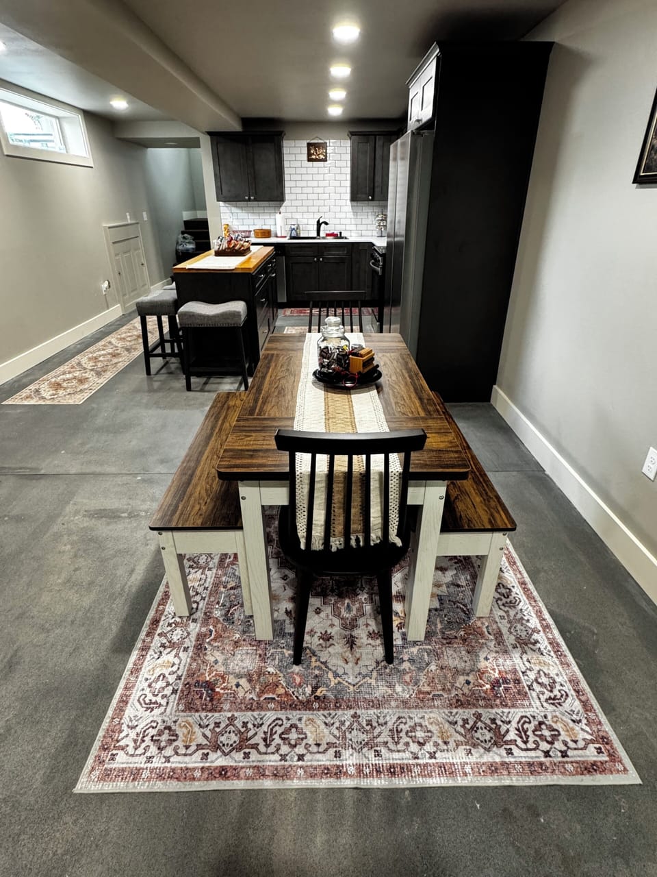 Stocked kitchen for eating in and ample room at the table for all