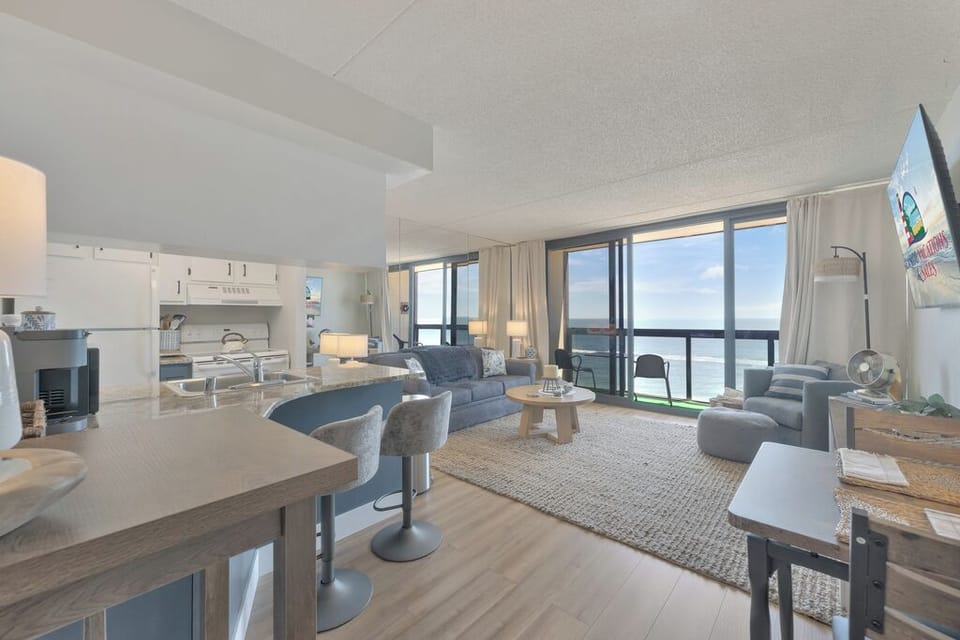 Bright, airy, and seamless - perfectly connecting the kitchen, dining, and living areas.