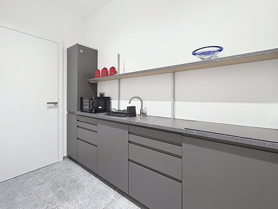 Cabinetry, Interior Design, Kitchen, Flooring, Furniture, Countertop, Drawer, Room, Shelving, Kitchen Appliance