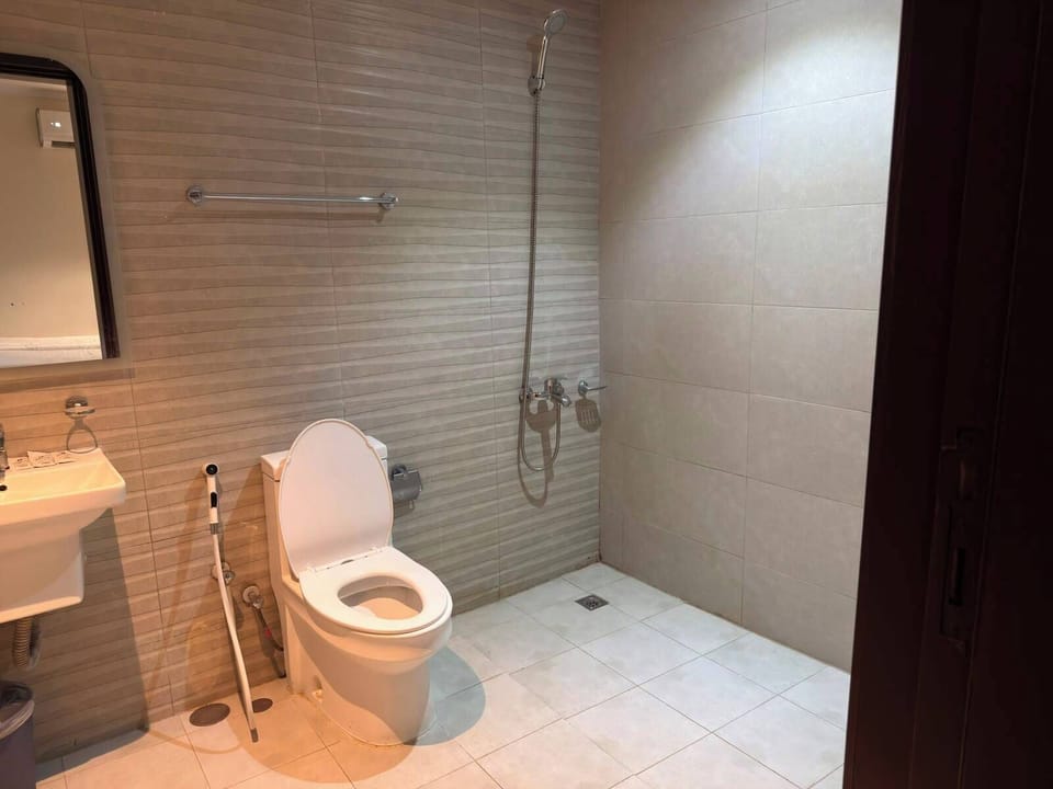 Shower, towels, soap, shampoo