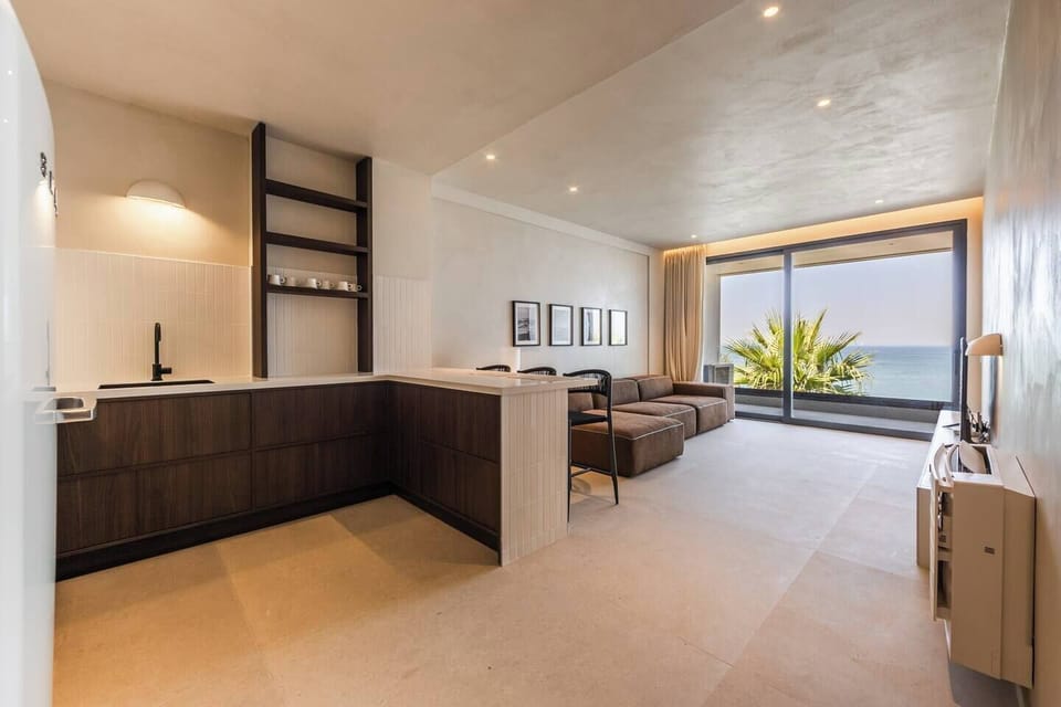 Living room and fully-equipped kitchen