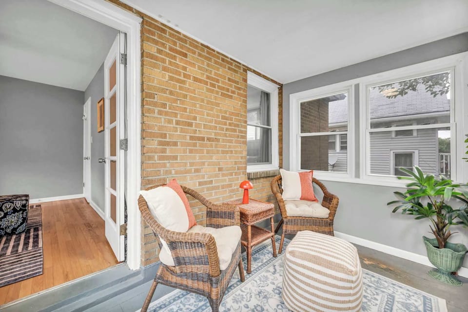 Sip your morning coffee in the sunny plant-filled sunroom