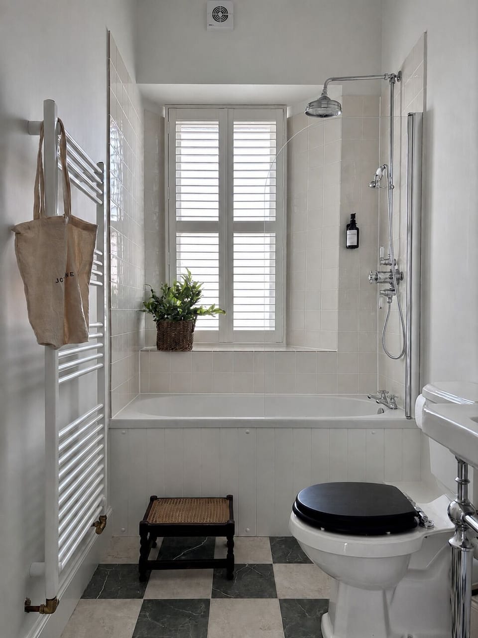 Bright bathroom with tub, rainfall shower, and lovely natural light