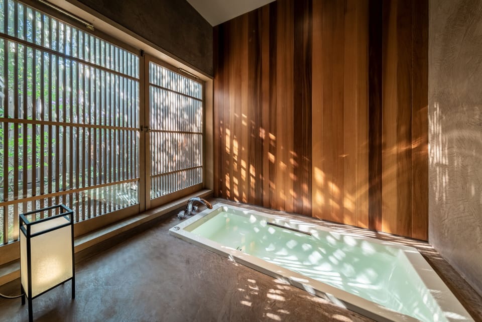 Traditional House, 4 Bedrooms, Kitchen, Garden View | Bathroom | Combined shower/tub, deep soaking tub, rainfall showerhead