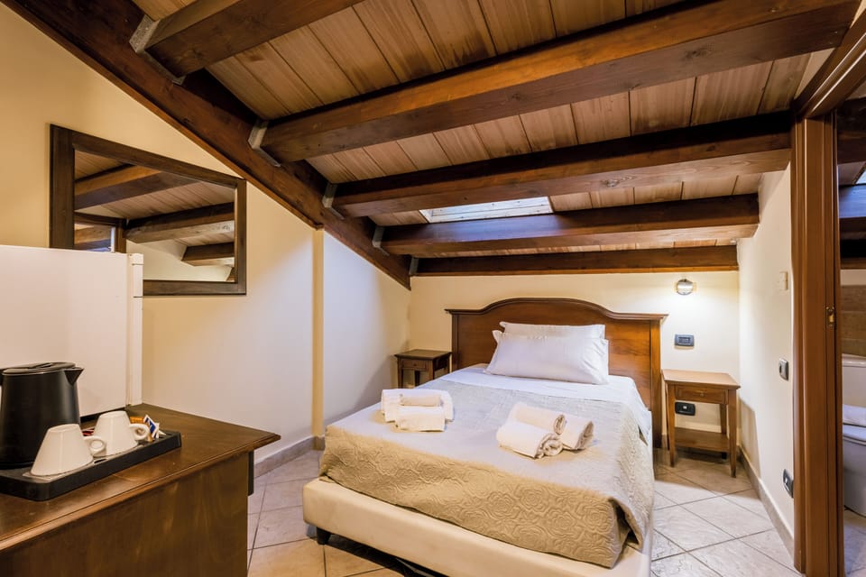Economy Single Room | Minibar, in-room safe, blackout drapes, iron/ironing board (on request)
