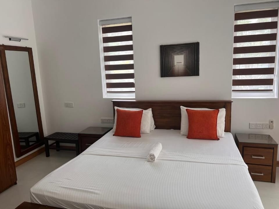 Deluxe Double Room, Patio, Garden View | In-room safe, desk, laptop workspace, blackout drapes