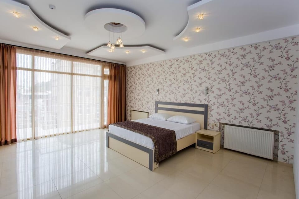 Double Room, Balcony, City View | Laptop workspace, WiFi (free), bed sheets