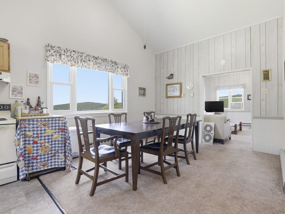 Dining Area | Dark Wood Dining Table | Mountain Views & Vaulted Ceilings