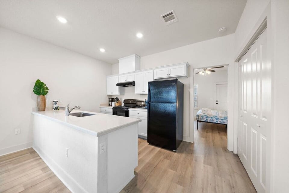 Find joy in the simplicity of this chic and well-organized culinary space