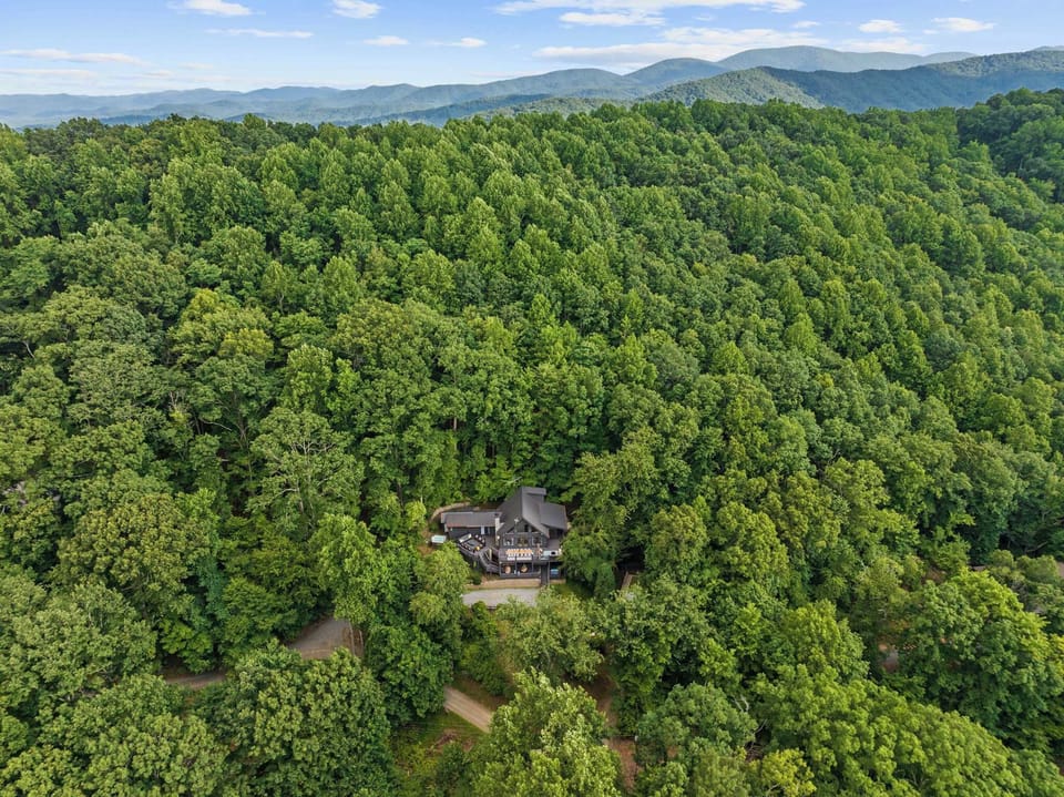 Plot twist: The best view isn't just from the house—it's of the house! Surrounded by beautiful greenery, your perfect escape starts right here.