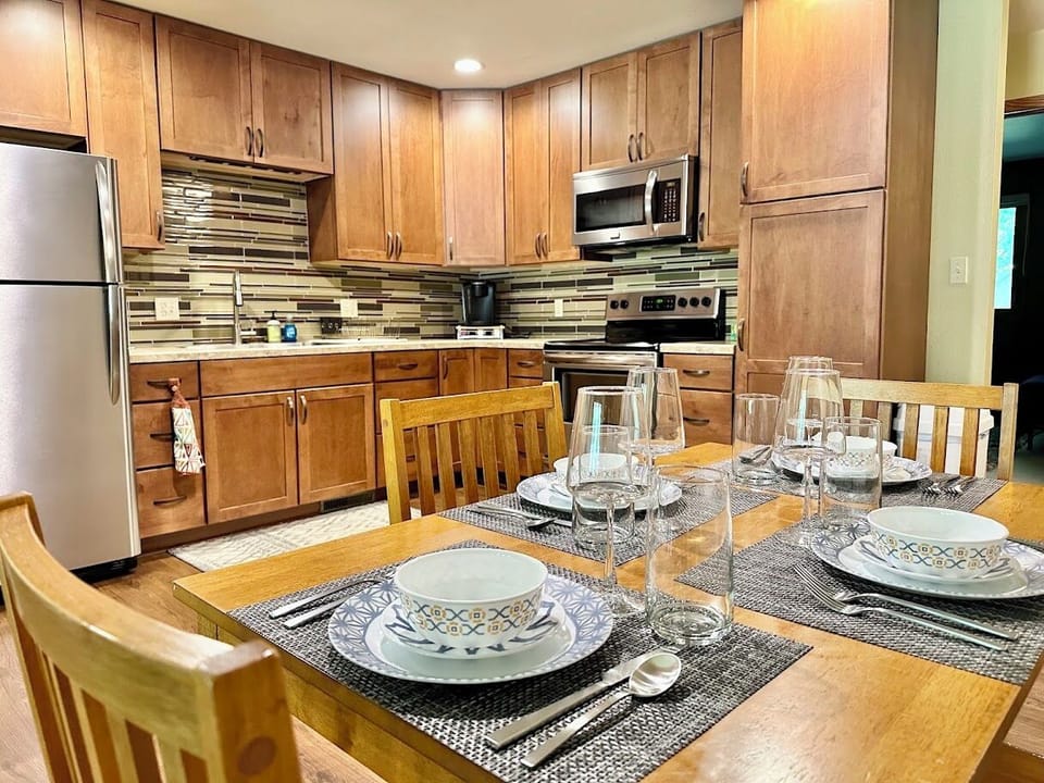 Enjoy home-cooked meals in this spacious dining and kitchen area.