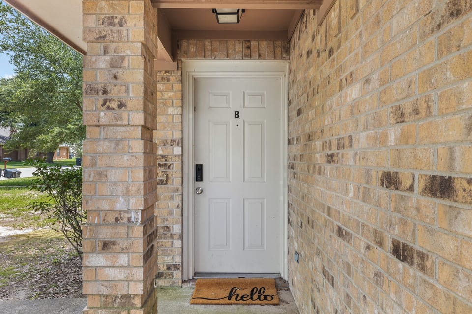 Private covered entry with keyless access and a warm welcome