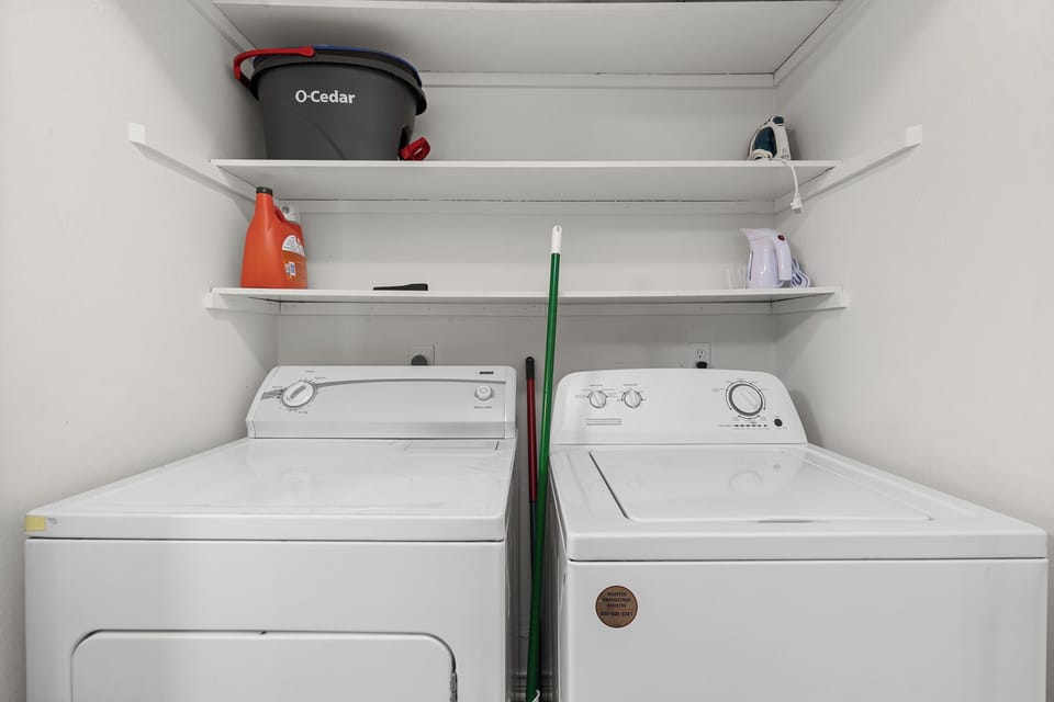 Convenient in-home washer and dryer with handy storage shelves