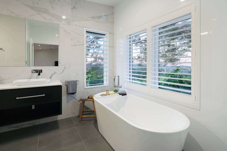 Relax in the luxurious bathtub after a day exploring