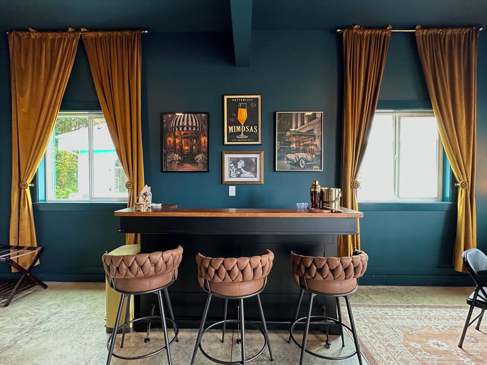 Pull up a velvet stool and let someone else make the drinks tonight — the speakeasy bar is stocked and ready the second the first cocktail order comes in.