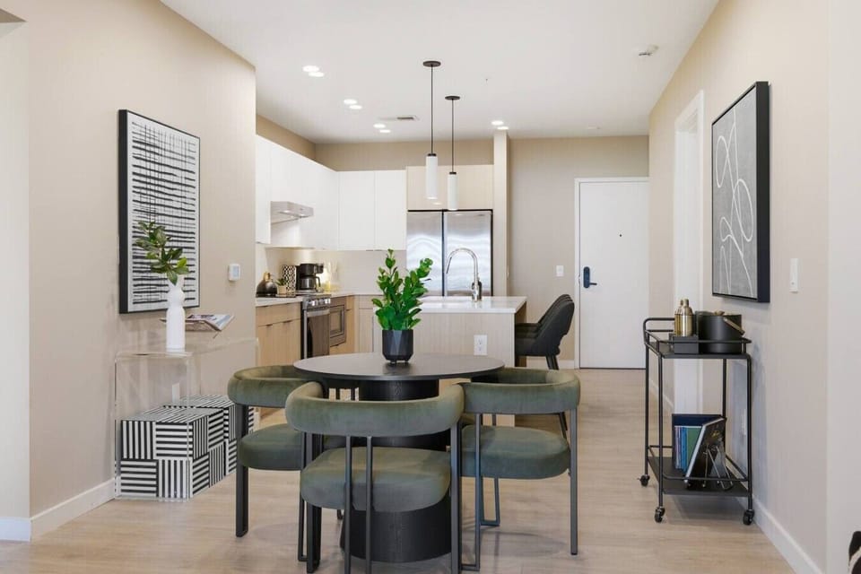 Seating for 4 in the dining area, plus additional seating available at the kitchen island.