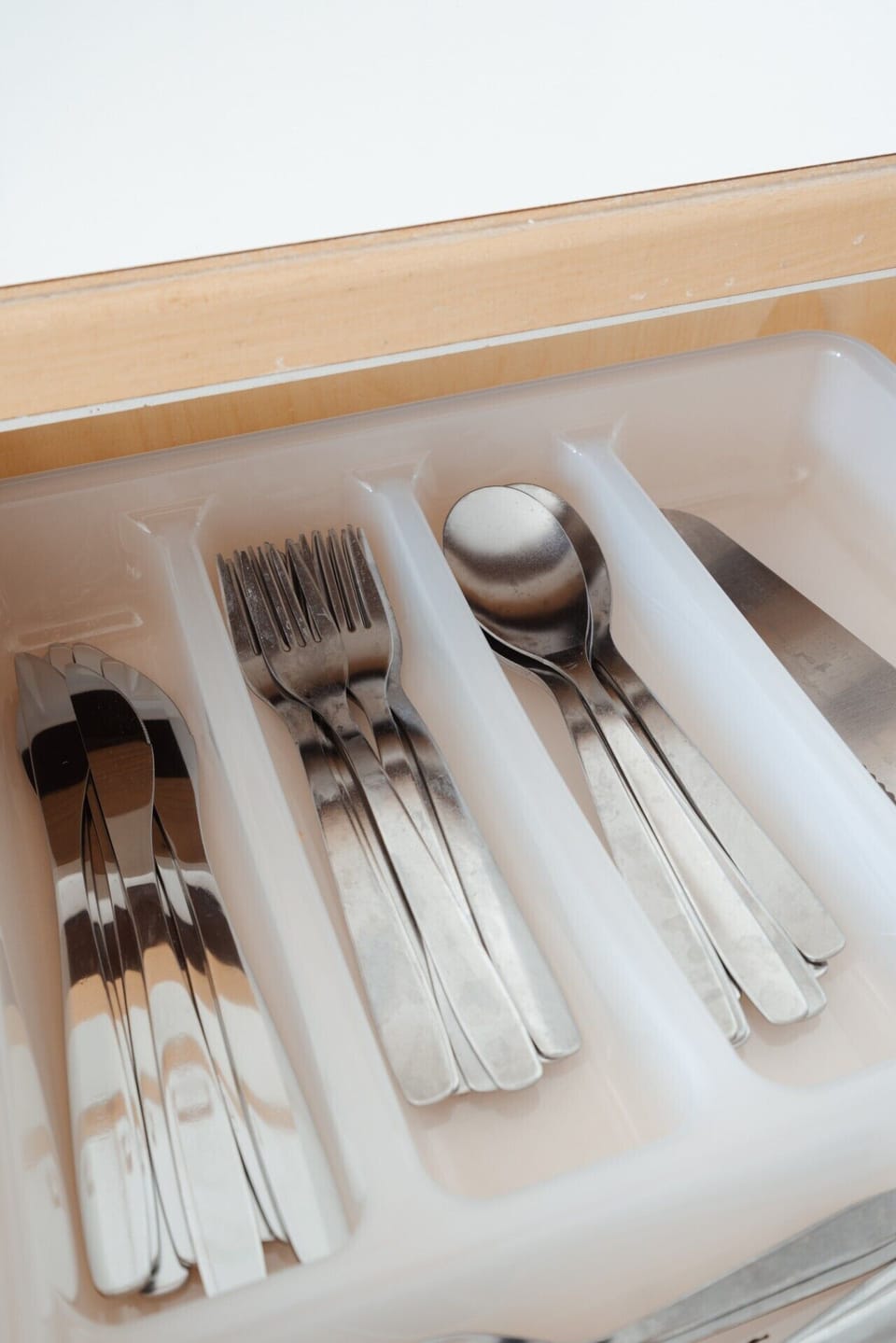 Kitchen drawer with neatly organized cutlery