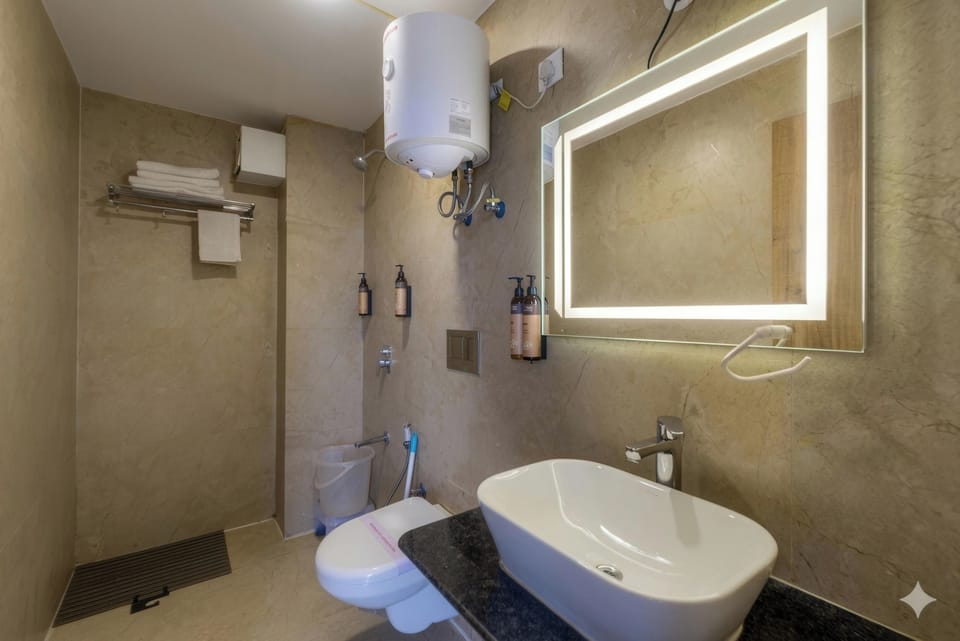 Deluxe Room | Bathroom | Slippers