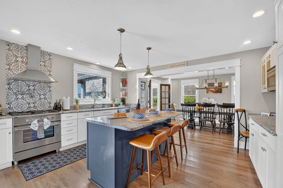 Bright, open-concept kitchen designed for gathering and entertaining.