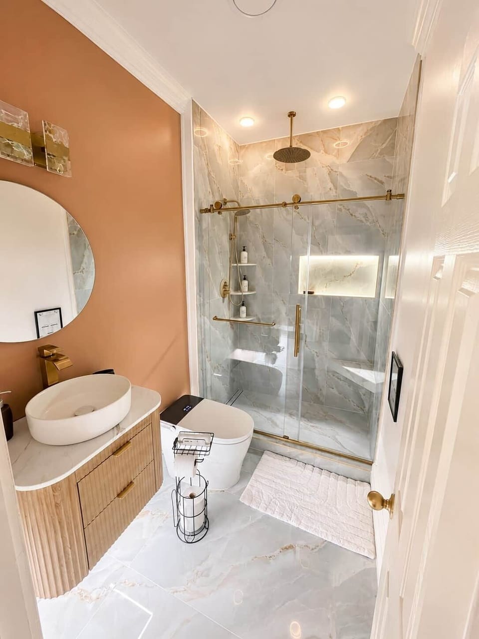 Private bathroom with walk-in glass shower in Chef’s Château Suite C