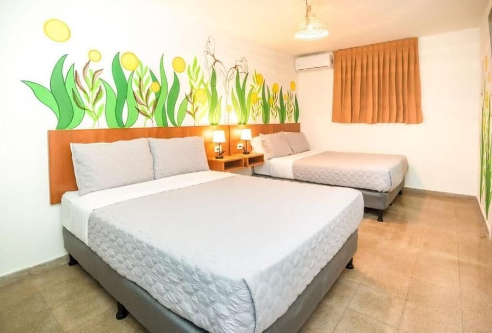 Quadruple Room, Private Bathroom | Desk, blackout drapes, iron/ironing board (on request), WiFi (free)