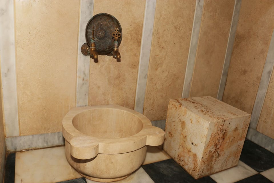 Shower, hair dryer, slippers, towels