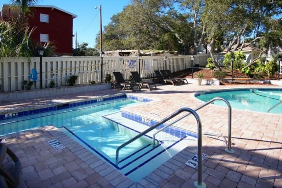 The Chelsea House Villa has pools located behind the Villa 