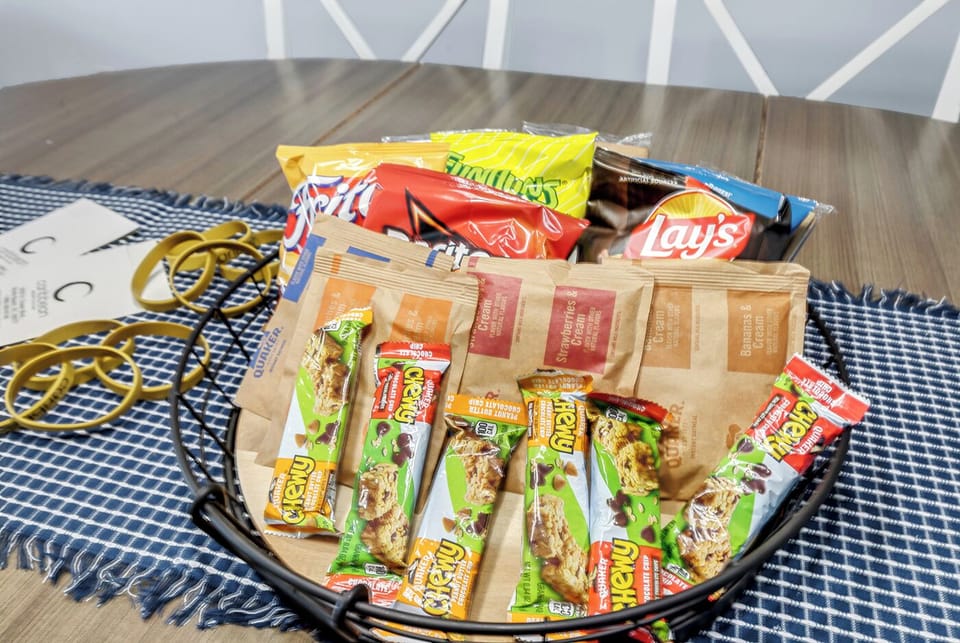 Enjoy a snack when you arrive. Parking passes and pool bands provided. 