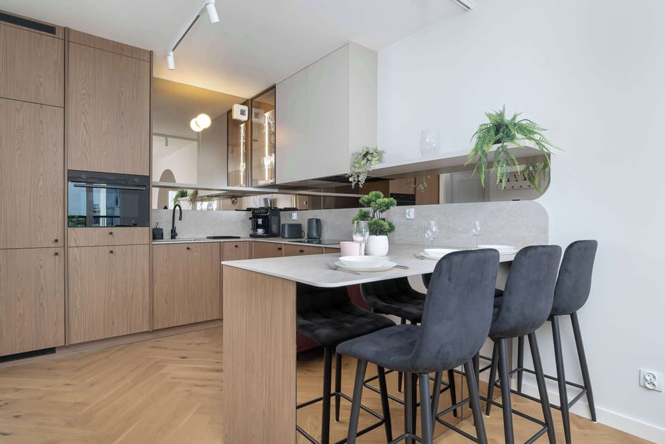 Cook and dine in style with the modern kitchenette and dining area.