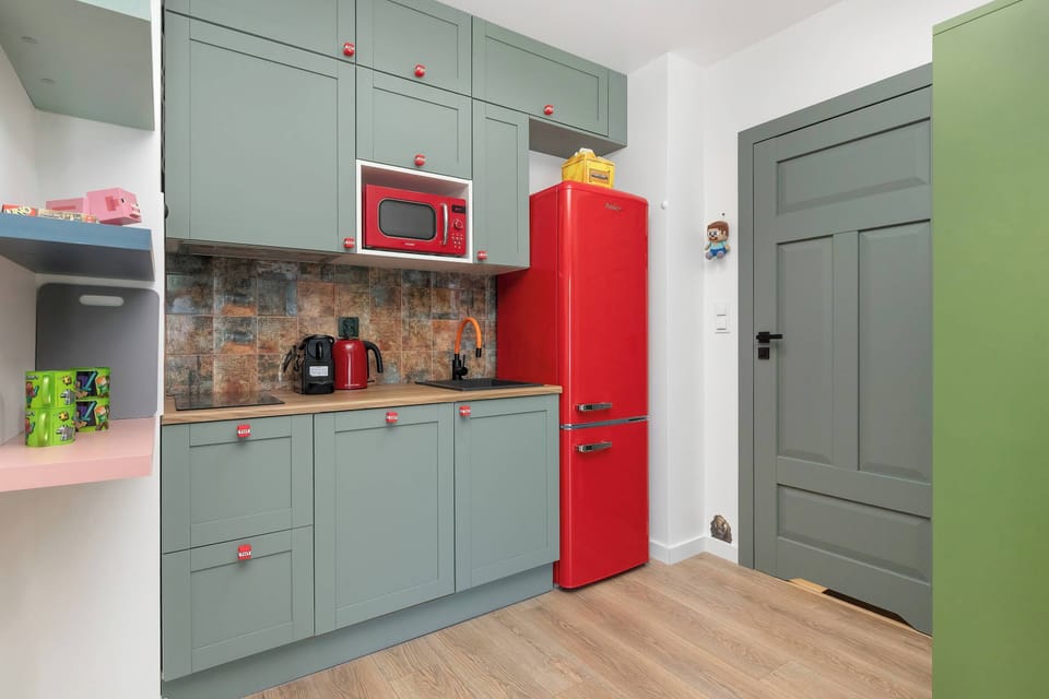 The kitchenette's practical layout maximizes space and functionality.