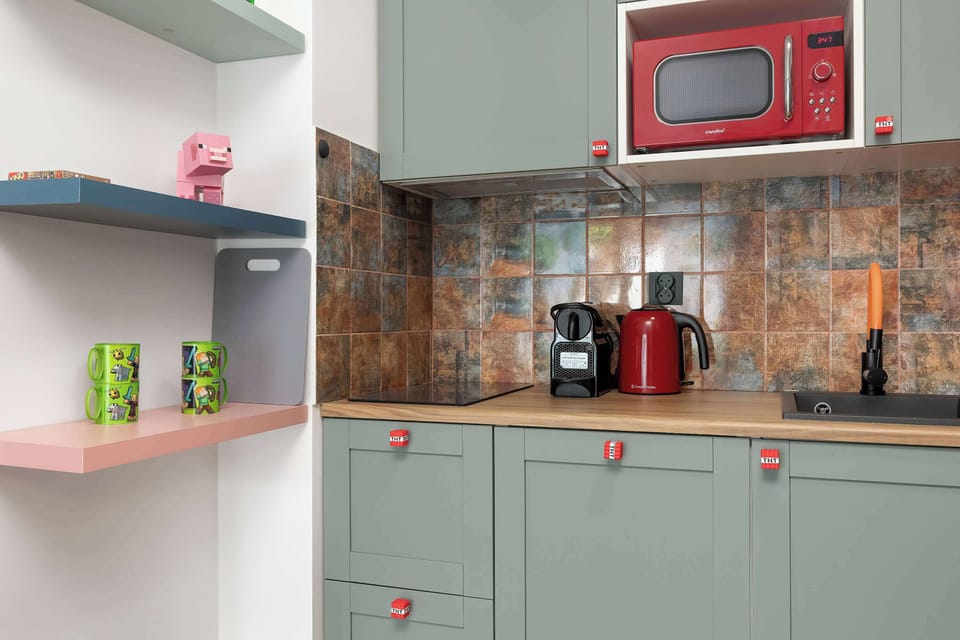 The fully equipped kitchenette includes everything you need for a home-cooked meal.