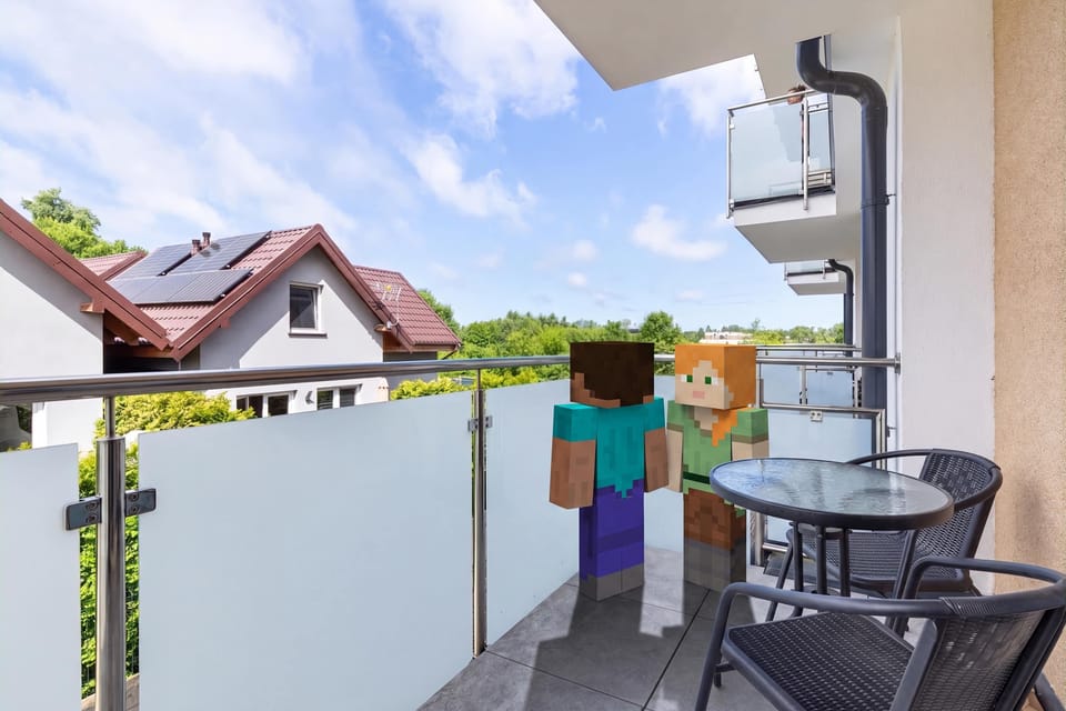 The balcony provides a perfect spot for enjoying the fresh air. 