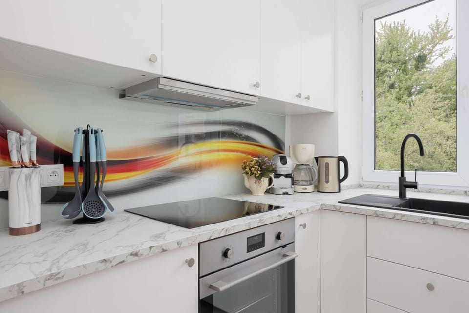 The kitchen has modern appliances that make it easy to prepare meals.