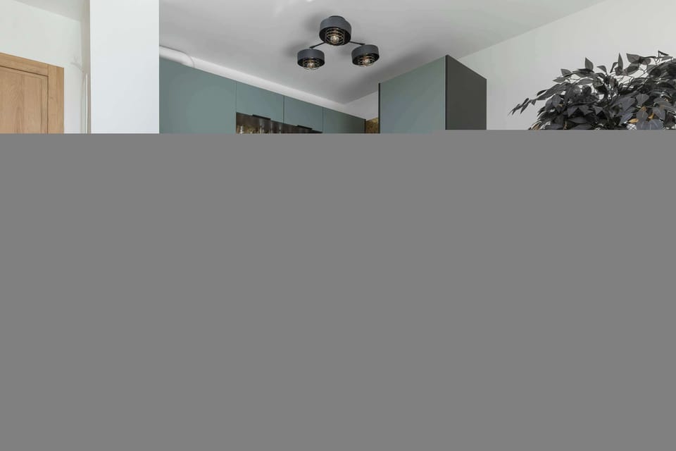 Cook and dine in style with the modern kitchenette and dining area.
