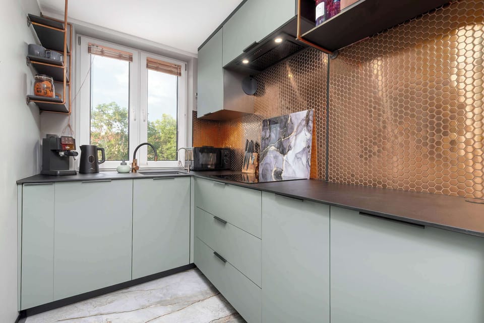The kitchen offers a functional layout for convenient cooking.