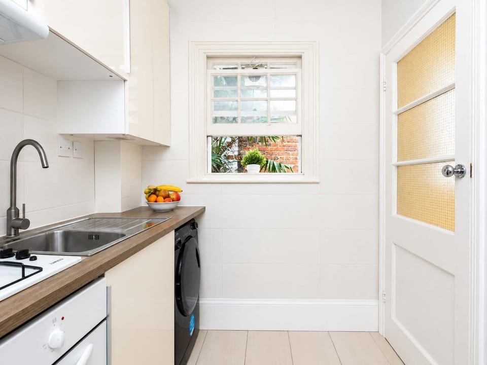 The kitchen is fully equipped to prepare a simple meal 