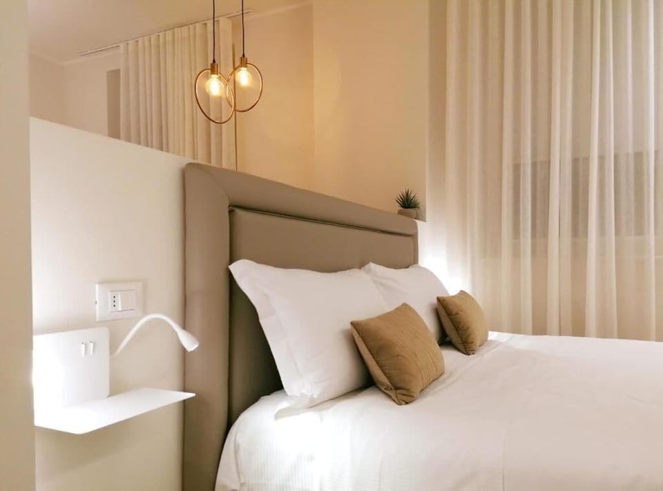 Superior Double Room, Kitchenette | Minibar (free items), in-room safe, blackout drapes, soundproofing