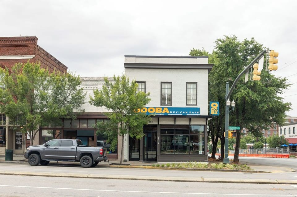 Corner location in a walkable neighborhood near dining, shops, and local hotspots