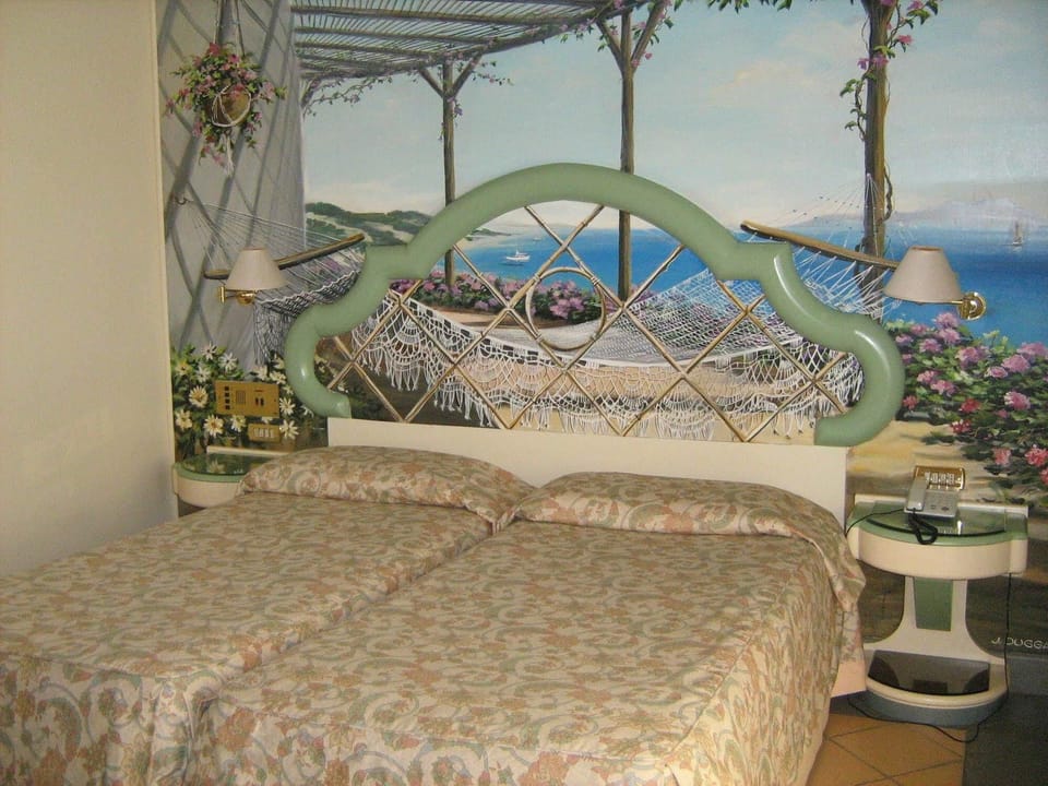 Double or Twin Room, Garden View | Minibar, in-room safe, blackout drapes, soundproofing