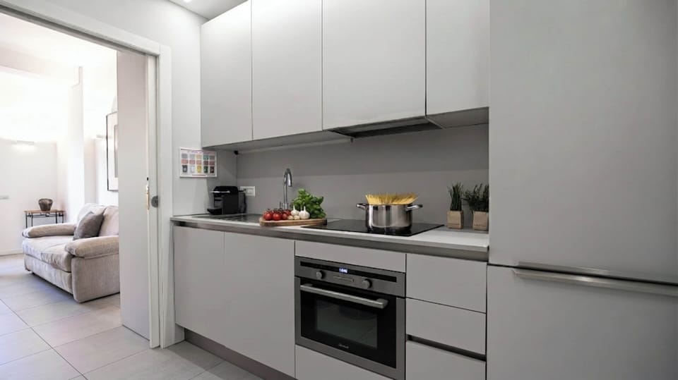 Apartment (2 Bedrooms) | Private kitchen | Espresso maker, microwave, electric kettle, highchair