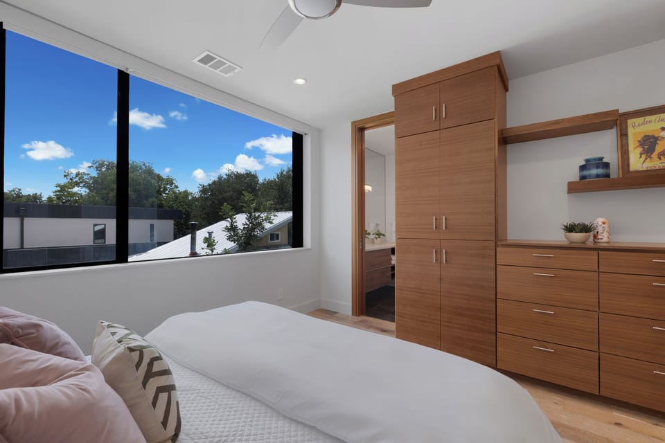 Texas art and built-in walnut storage give this room character.