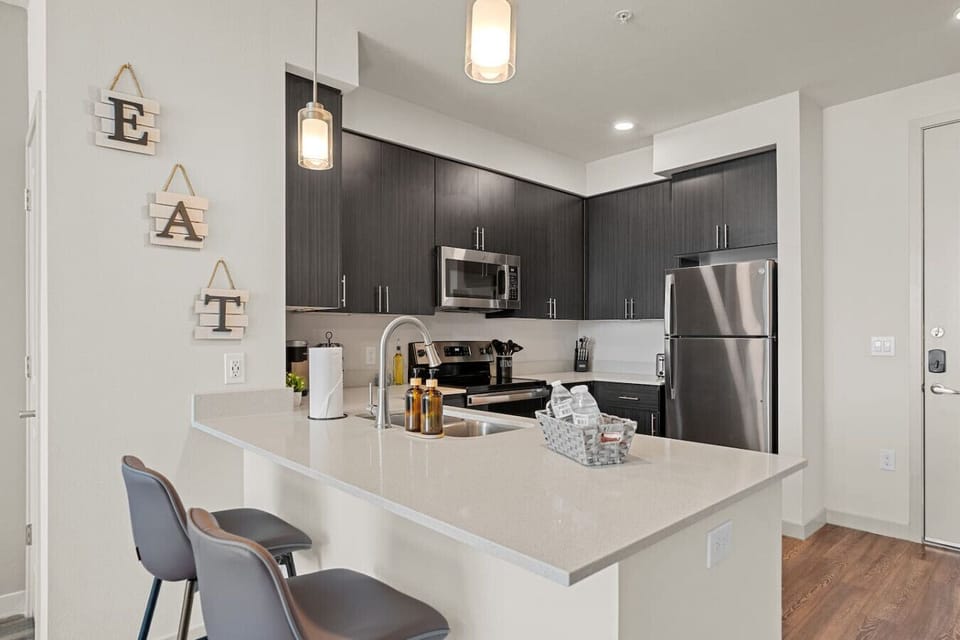 Enjoy casual meals and conversation at the kitchen breakfast bar.
