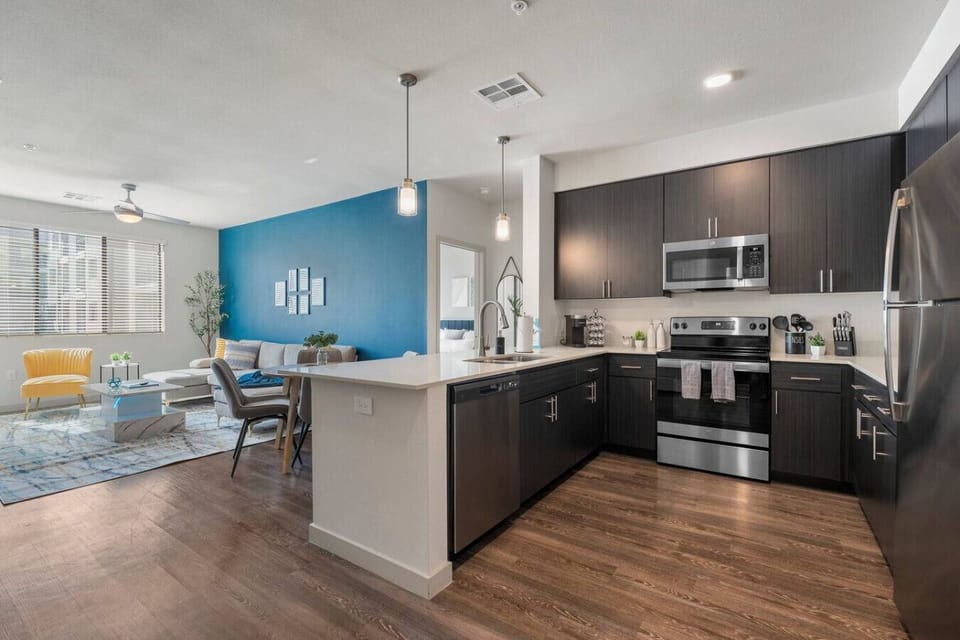 A modern kitchen made for foodies — complete with full-size appliances, sleek cabinetry, and coffee-ready mornings