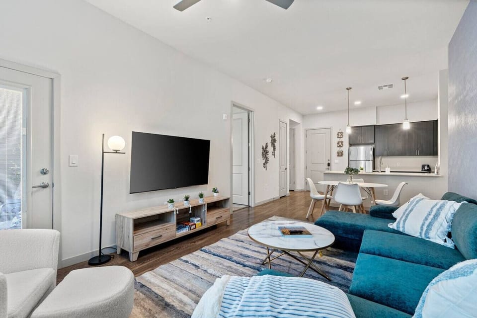 Relax and enjoy the stylish and comfortable ambiance of this inviting living space, perfect for both quiet evenings and group gatherings.